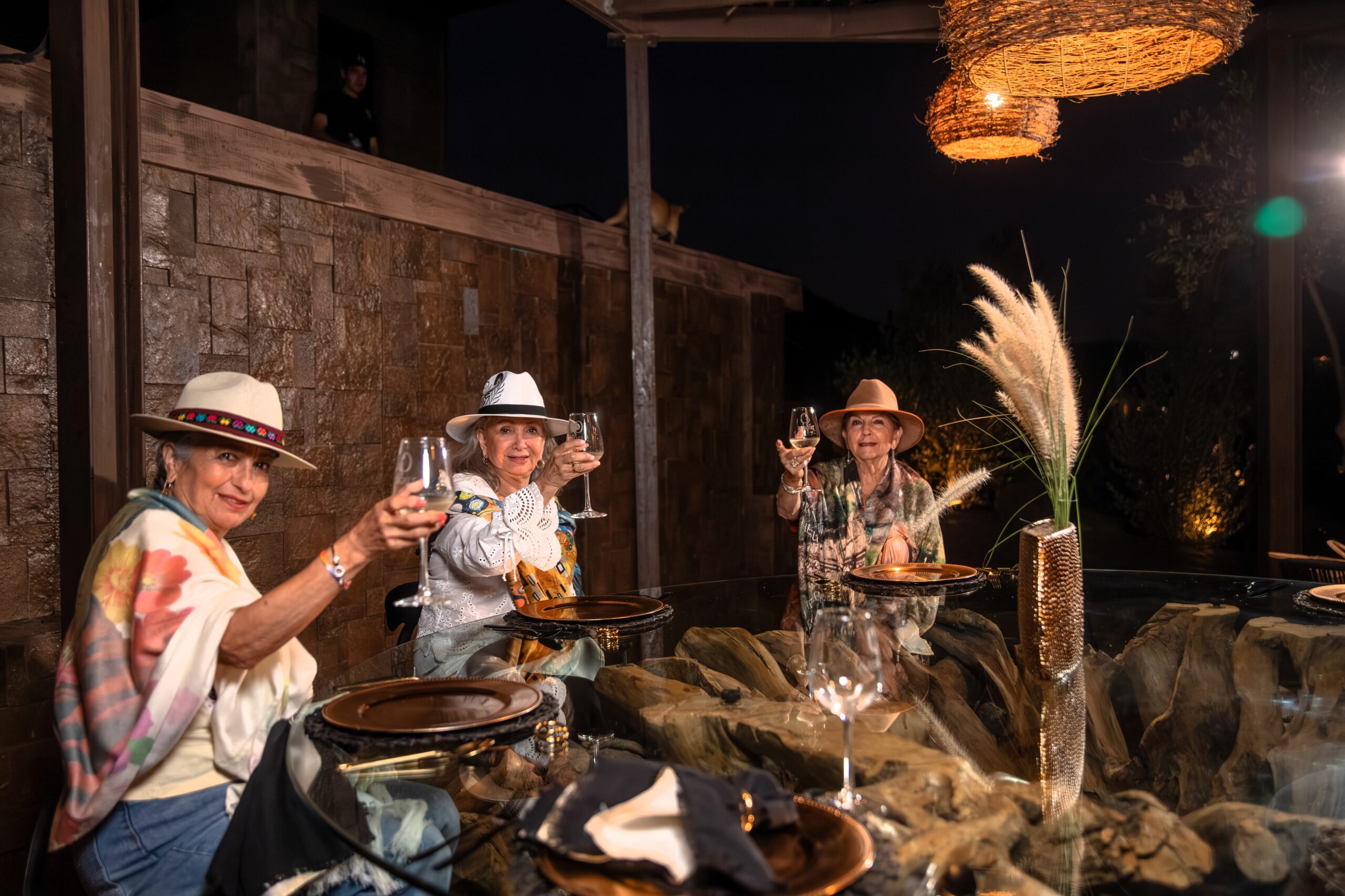 Senior women enjoying wine together at O2 Resort Valle de Guadalupe in the relaxing surroundings of Baja California wine country