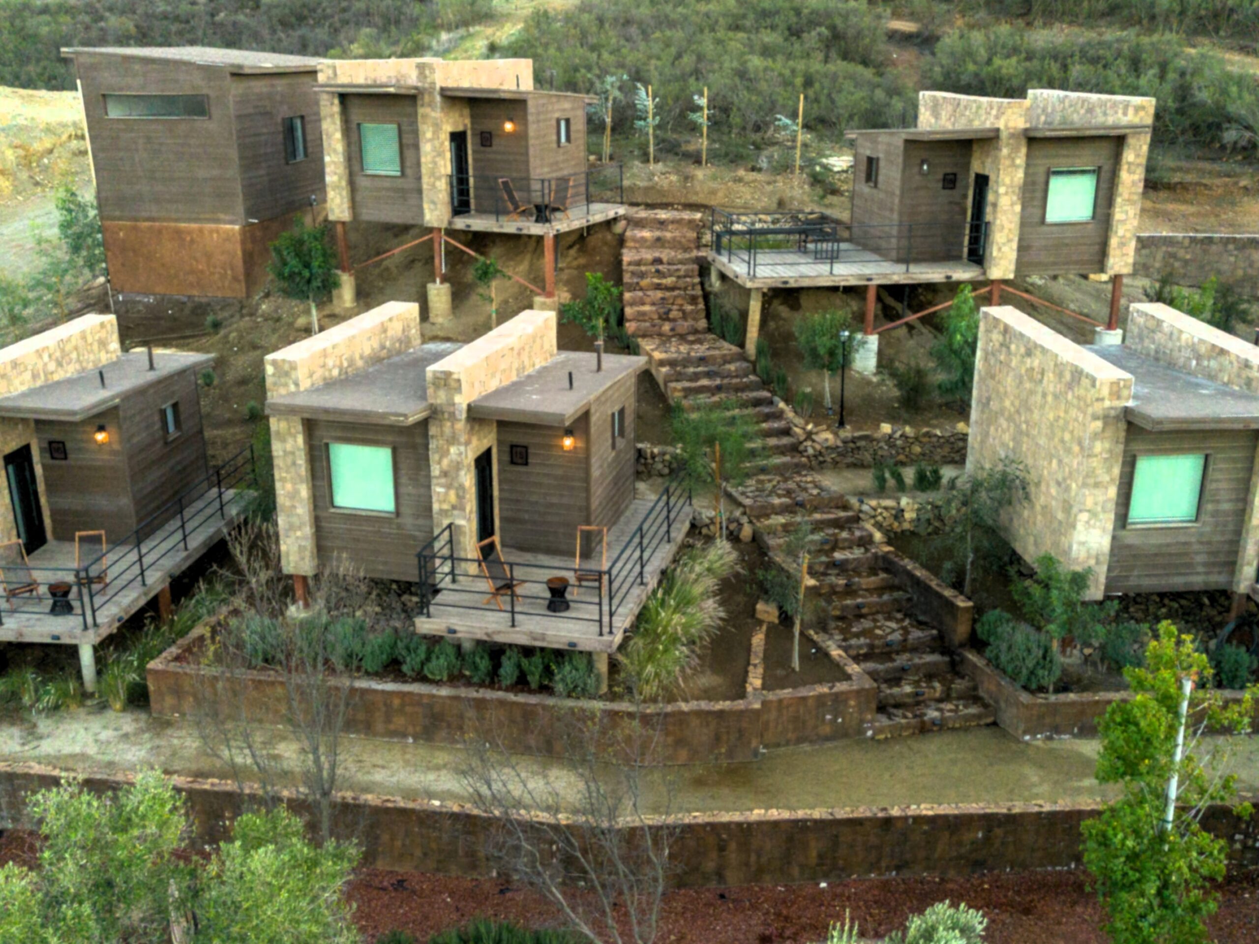 Luxury cabins at O2 Resort Valle de Guadalupe offering peaceful accommodations surrounded by the natural landscape of Baja California wine country