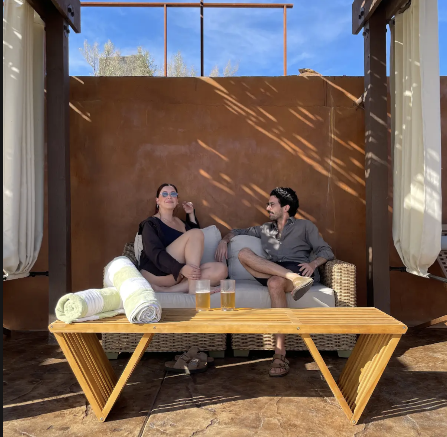 Woman and man enjoying time together at O2 Resort Valle de Guadalupe surrounded by the relaxing atmosphere of Baja California wine country