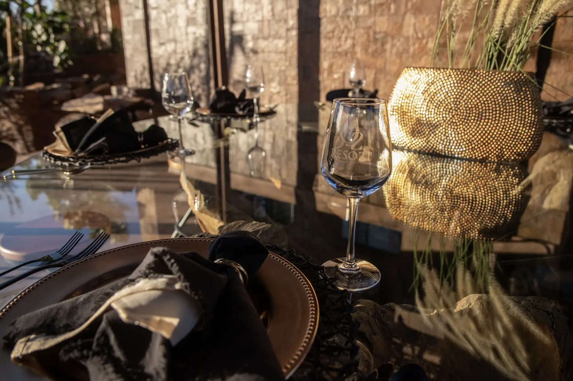Wine glass at O2 Resort Valle de Guadalupe highlighting the relaxing wine country experience in Baja California