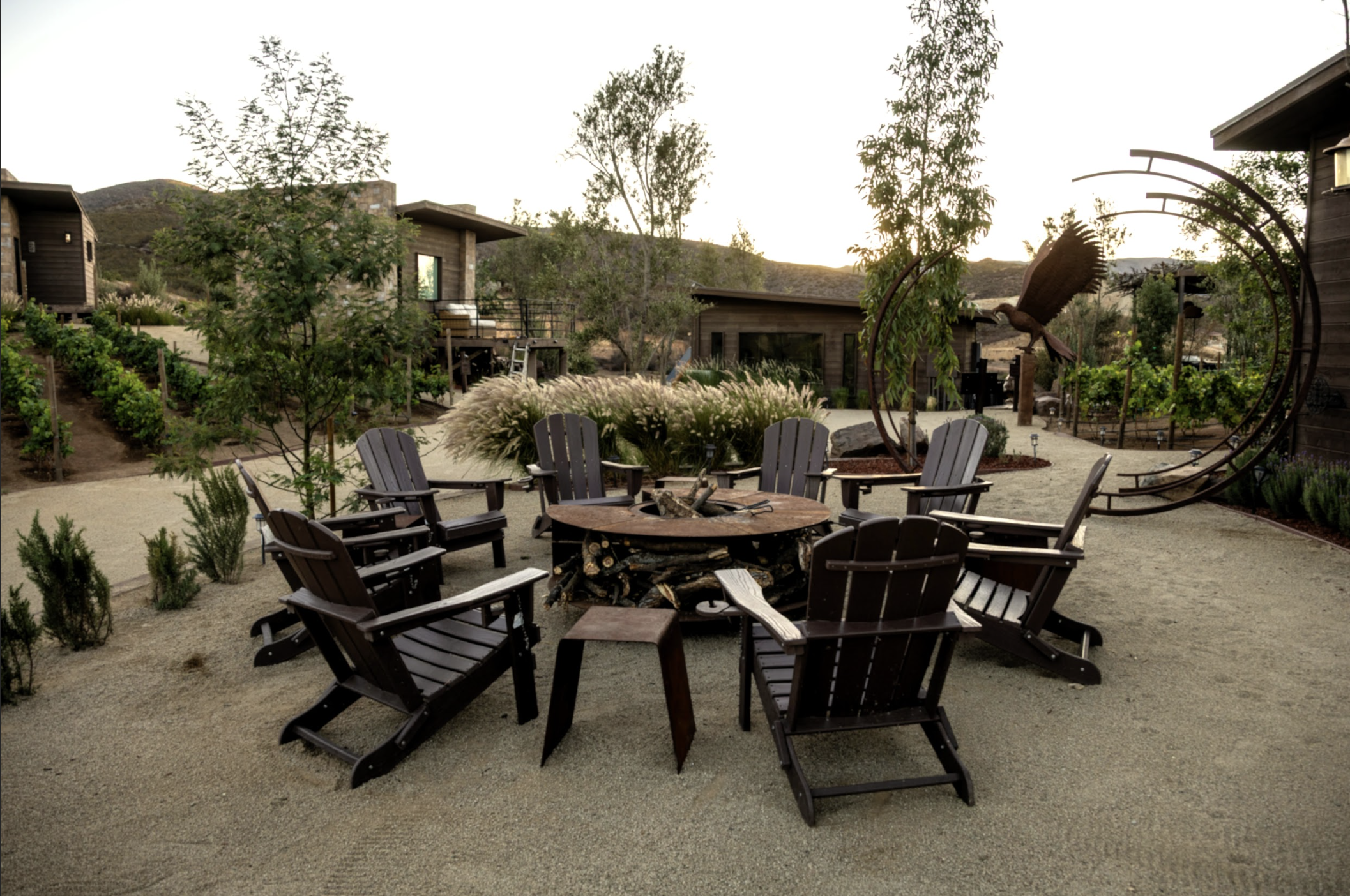 Outdoor seating area at O2 Resort Valle de Guadalupe offering relaxing views of the surrounding Baja California wine country
