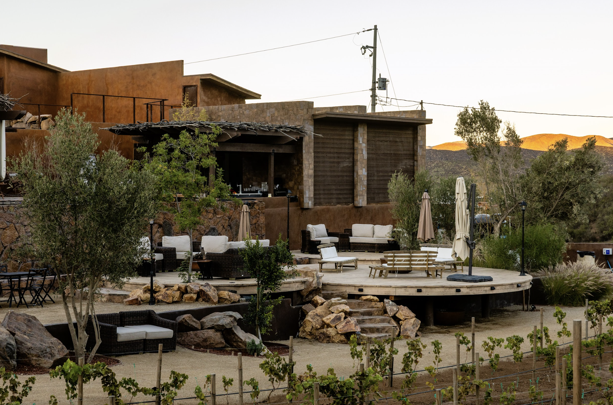 Outdoor seating area at O2 Resort Valle de Guadalupe offering relaxing views of the surrounding Baja California wine country