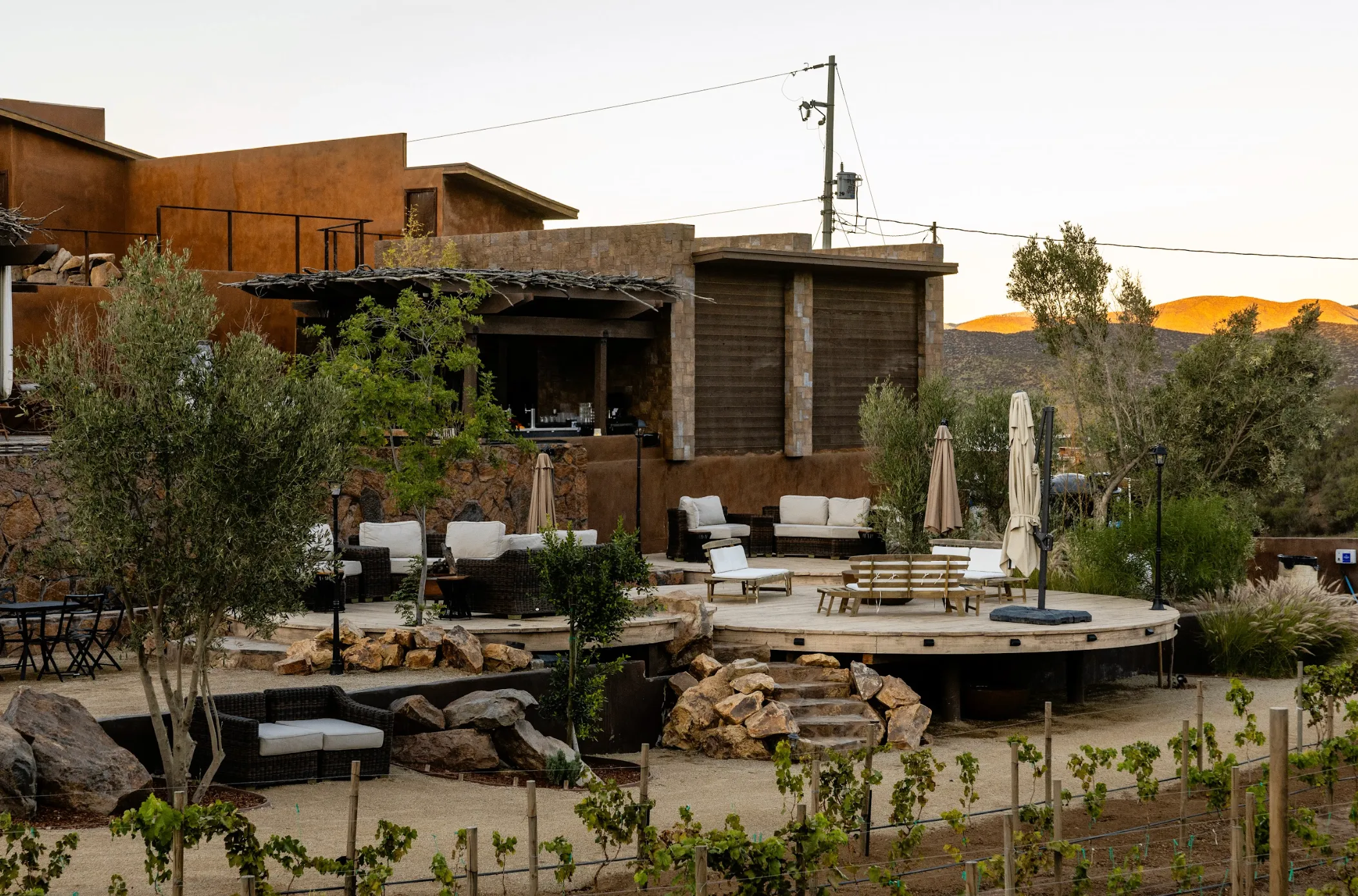 Outdoor seating area at O2 Resort Valle de Guadalupe offering relaxing views of the surrounding Baja California wine country