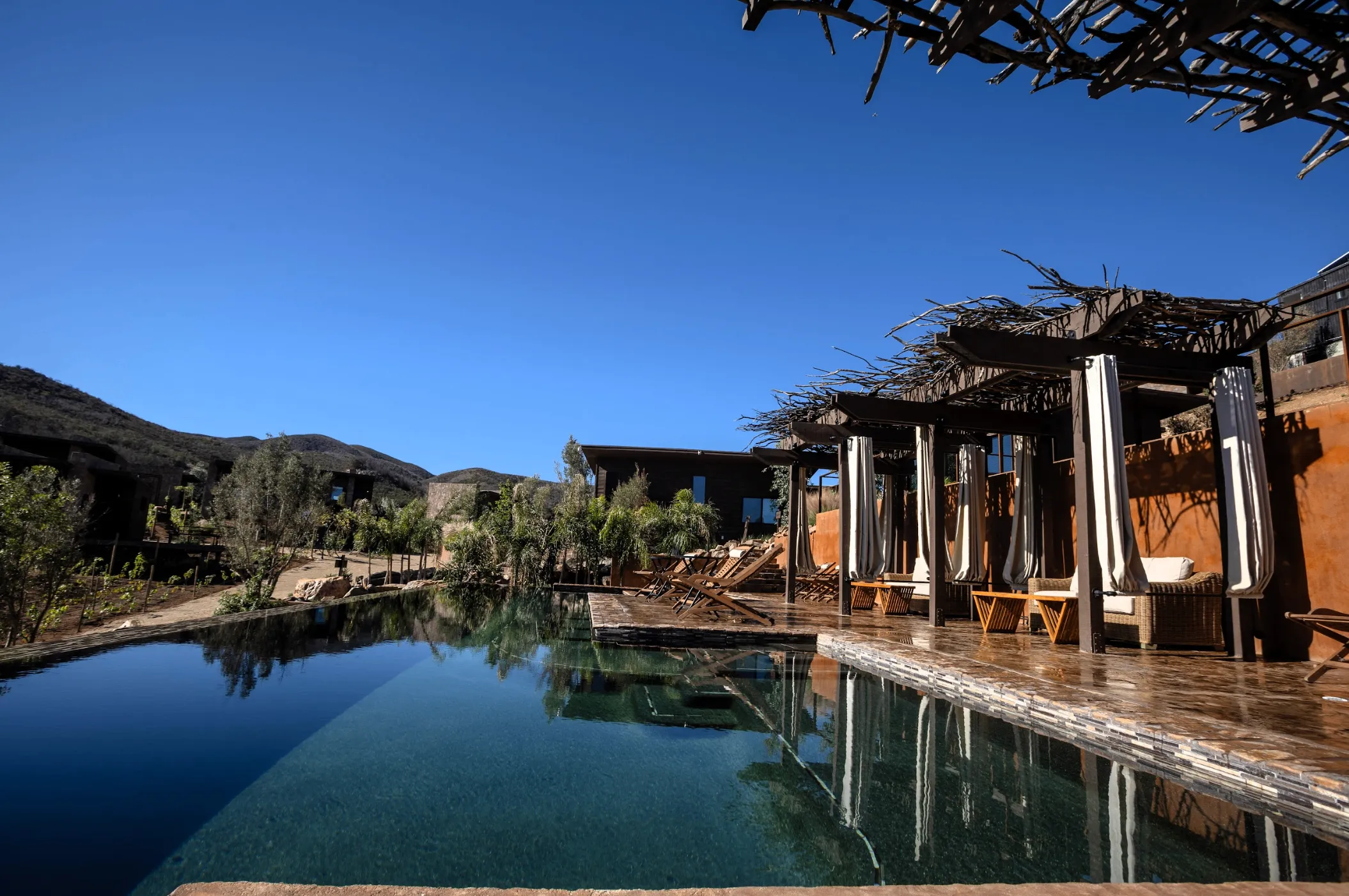 Luxury swimming pool at O2 Resort Valle de Guadalupe offering a peaceful outdoor retreat in Baja California wine country