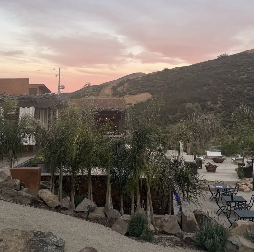 Exterior view of O2 Resort Valle de Guadalupe surrounded by the scenic natural landscape of Baja California wine country
