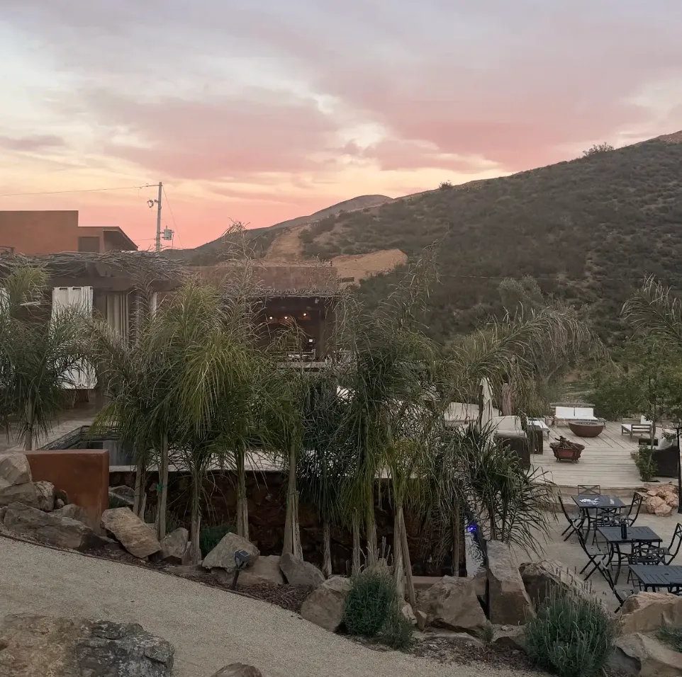 Exterior view of O2 Resort Valle de Guadalupe surrounded by the scenic natural landscape of Baja California wine country