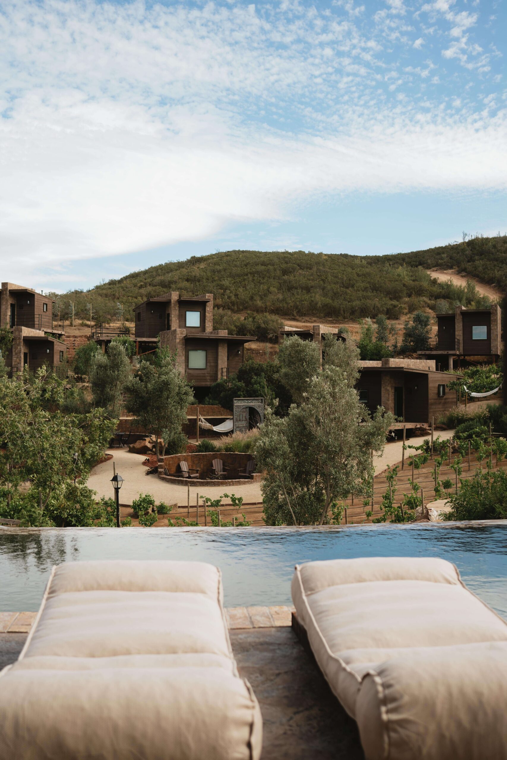 Luxury sun bathing experience at O2 Resort Valle de Guadalupe with vineyard views and peaceful outdoor relaxation